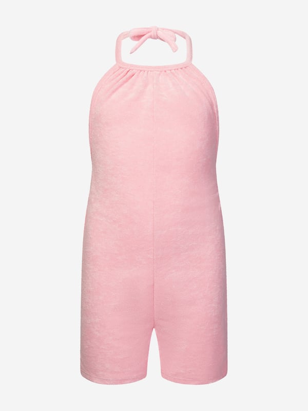 Comfort and style converge for this girls pink playsuit from AY by Ayla. Designed for young influencers, this cosy fleece piece is made for dreaming big with a fashionable twist. Perfect for playdates as well luxe lounging, the soft, lush fabric ensures that feel good factor. Halterneck Tie Fastening Bound Trims