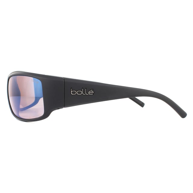 Bolle Zonnebril King BS026007 Mat Zwart Phantom + Photochromic gepolariseerd 85% is een sportieve wrap rondom model met dikke dikke armen en met thermogrip tempel tips en neuskussens voor extra comfort