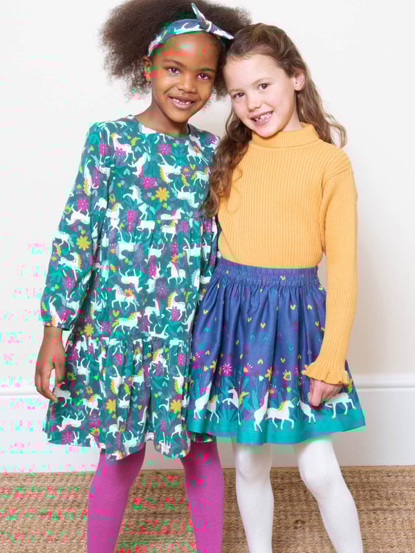 Enjoy all the practicality of a top plus the warmth and comfort of a jumper with this choice. Featuring a gorgeous butterscotch rib knit, roll neck and frill cuff detail, this piece of organic knitwear goes perfectly with so many of Kite's skirts, dresses and more.