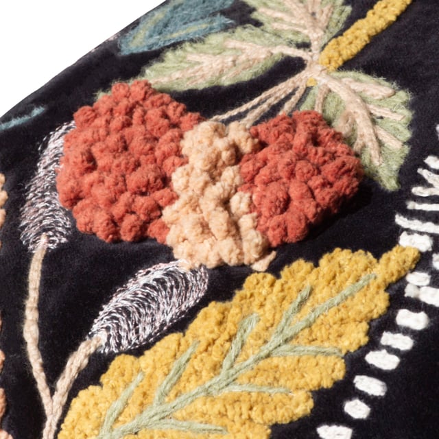 An amazing mix of embellished embroidery, applique and tufted cotton define this clever design. The further away you view this cushion, the easier it is to see the depiction of an exotic zebra munching on the surrounding fruits of the jungle, which are also lovingly embroidered onto the design. This is all surrounded by a sumptuous cotton velvet background which further makes these intricate details stand out even more. An ideal way to create intrigue and add an exotic feel to your home. Size: 50 x 50cm