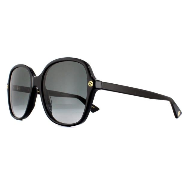 Gucci Sunglasses GG0092S 001 Black Grey Gradient are a simple and sophisticated squared design. Their versatility ensures an easy to wear frame that will suit any wardrobe or occasion. The oversized lenses are chic and the interlocking Gucci GG logo can be found on the frame front.