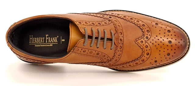 Traditional hand finished shoe with a classic brogue design and a must for any man's wardrobe for a perfect fit with formal attire. Made from genuine high quality burnished leather and cusion insole for superior comfort. These are soft to touch and look great with suits and smart wear. Handmade leather shoes with Genuine leather upper.