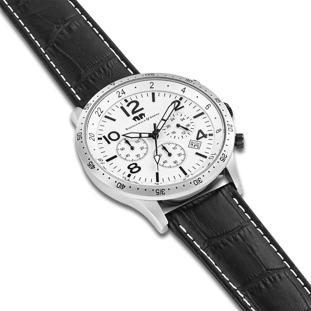 The men's watch from the Rhodenwald & Sons manufacture combines the design of sporty chronographs with the timeless elegance of a dresswatch. The model from the "Flight Captain" series is based on the tricompax arrangement of classic pilot watches and scores with a 24-hour display, stopwatch and date. In terms of color, the totalists fit harmoniously into the subtle dial - a noble companion with the aura of freedom, adventure and fame. The timepiece convinces with a robust stainless steel housing, luminiscant sticker and a reliable quartz train. A real leather strap with crocodile, contrast seam and thorn closure rounds off the premium equipment.