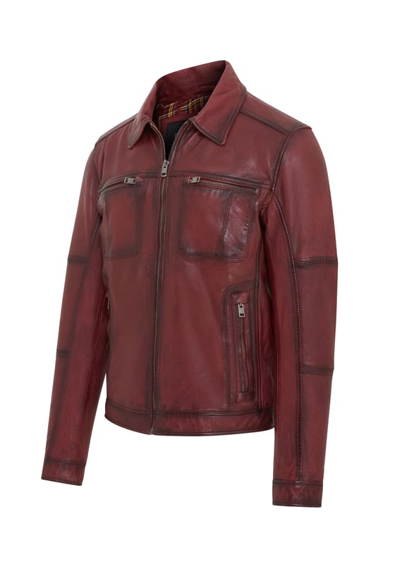This Harrington biker jacket is a timeless classic, crafted from premium lamb leather with a vintage rub-off finish for a distinctive, worn-in look. Designed with functionality and style in mind, it features four outer zipped pockets and two internal pockets for practicality, along with a soft cotton lining for added comfort. The jacket’s sleek design, durable construction, and retro vibe make it an ideal choice for both casual outings and biker enthusiasts.

Premium lamb leather with a unique vintage rub-off finish.
Soft cotton lining for maximum comfort.
Four outer zipped pockets and two internal pockets for ample storage.
Classic Harrington collar for timeless style.
Durable front zip closure for easy wear.
Perfect for casual wear or adding a retro touch to your wardrobe.