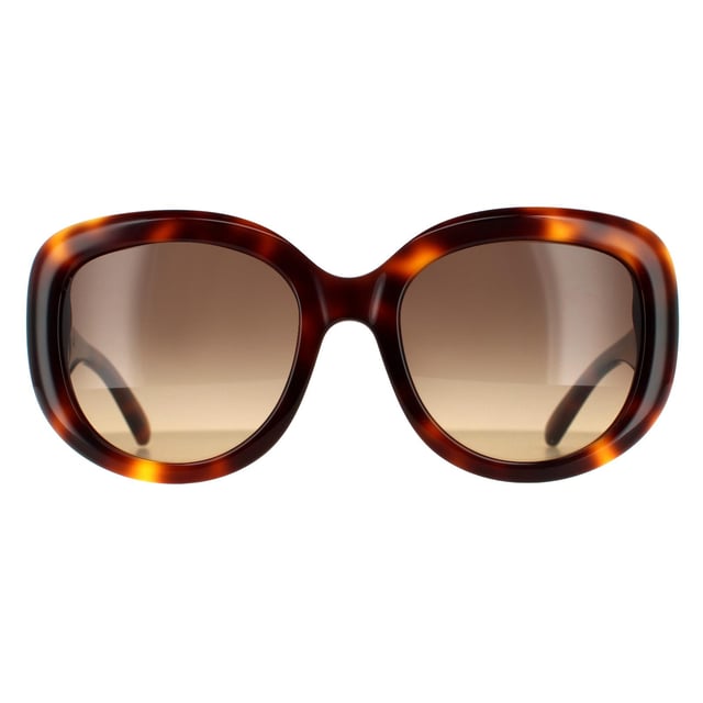 Salvatore Ferragamo Oval Womens Tortoise Brown Gradient Sunglasses SF727S are a modern oval style crafted from lightweight acetate. The Salvatore Ferragamo logo features on the temples for brand authenticity