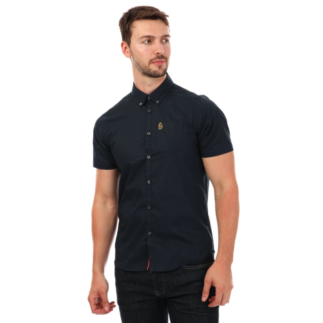 Mens Luke 1977 Iron Bridge Short Sleeve Shirt in navy.- Button down collar.- Short sleeves.- Chest pocket.- Button fastening.- Embroidered branding.- Shaped hem.- 98% Cotton  2% Elastane.  - Ref: M590802NAVY