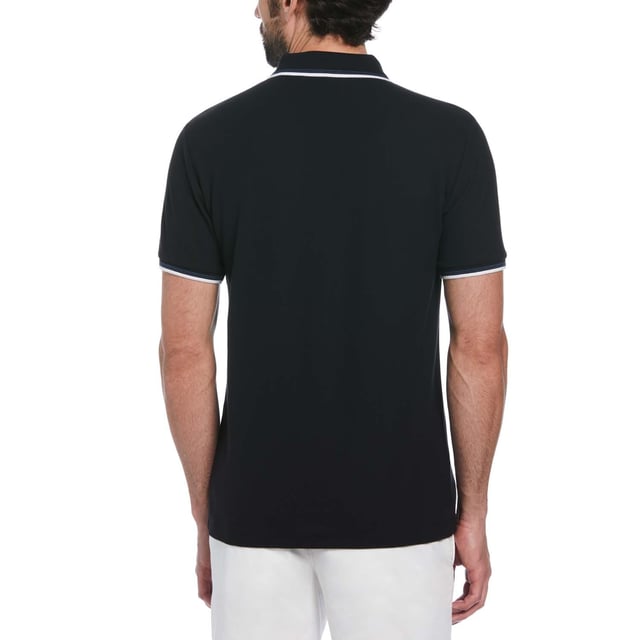 Every guy needs a solid polo shirt in their wardrobe and this Original Penguin one has you covered for style and comfort. Made from 100% organic cotton  it's soft and breathable and pique fabrication creates a subtle texture you can see and feel. A tipped collar pulls the look together and Pete offers his stamp of approval on the chest. Pair it up with jeans  chinos  or shorts  it's a versatile short sleeve top perfect for hanging with your buddies or going out for date night