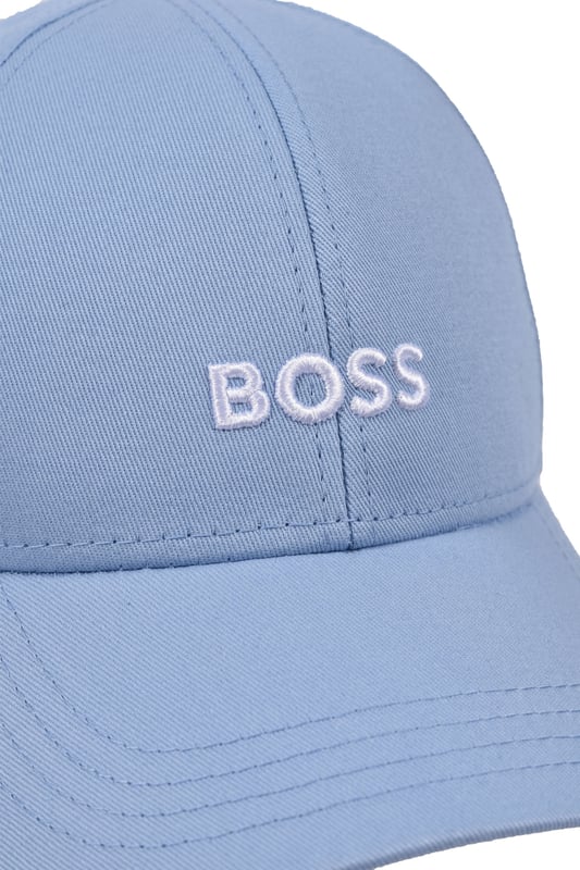 Boss Zed Baseball Cap in Open Blue
The BOSS Zed Baseball Cap is a timeless classic that will add a touch of sophistication to your everyday look. Made from a technical fabric with a moisture-wicking sweatband and breathable eyelets, this cap is incredibly comfortable to wear in all weather conditions. The iconic BOSS logo embroidered on the front in a contrasting colour makes this cap a must-have for any fan of the brand.
&nbsp;
Features

One size fits most
Adjustable for a custom fit
Embroidered BOSS logo
Metallic clasp at rear