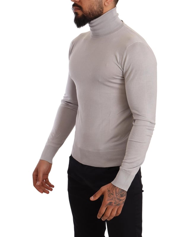 Brand: DOLCE & GABBANA
  Style: Turtleneck sweater
  Material: 70% Cashmere 30% Silk
  Design: Ribbed trims slips on easily
  Knit: Mid-weight
  Color: Light Gray
  Made in Italy
  Logo details
Material: 70% Cashmere 30% Silk