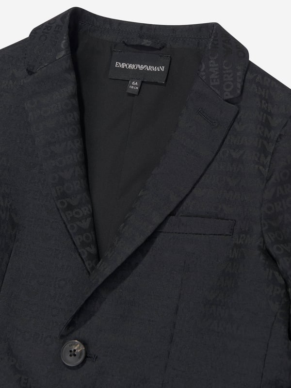 Emporio Armani Boys Branded Blazer in Navy Introducing the Emporio Armani Boys Branded Blazer in Navy for AW2024‚exquisite craftsmanship tailored for the young gentleman. This blazer is a pinnacle of style and elegance for any boy's wardrobe. **Luxurious Comfort:** Crafted with premium fabrics for unparalleled comfort durability. **Sophisticated Navy Blue:** A perfect shade that complements any occasion, ensuring your child looks sharp. **Classic Design:** Features a timeless cut with contemporary Armani styling, ideal for events or casual outings. Elevate your boy's style quotient with this prestigious blazer!