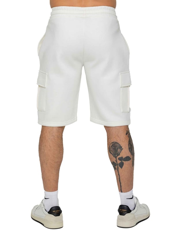 Experience comfort and style with Enzo's Men's Cargo Fleece Shorts. Made with brushed back inner fleece, these shorts offer a regular fit with 2 side pockets and 2 cargo pockets. The elasticated waistband, featuring the EZ logo, is adjustable with a drawstring for the perfect fit.