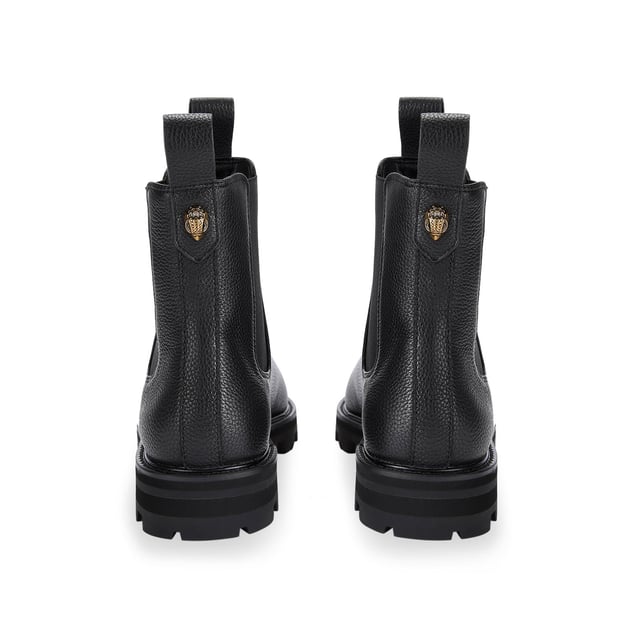 The Kurt Geiger Carnaby Chelsea Boot features a black leather upper. There are two pull tabs at the top of the ankle and elasticated panels for comfort. Sole height: 3cm.