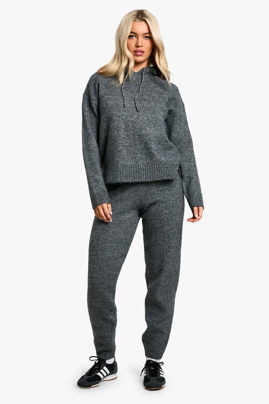 Cosy fine-knit tracksuit for ultimate comfort
        Hoodie features a relaxed fit with ribbed cuffs and hem
        Matching trousers with tapered leg for a sleek silhouette
        Versatile two-piece set for mix-and-match styling
        Soft-touch fabric blend for warmth and flexibility
    
    Embrace laid-back luxury with this fine-knit tracksuit, perfect for those days when comfort is key. The relaxed-fit hoodie pairs seamlessly with the tapered-leg trousers, creating a coordinated look that's both stylish and practical. Ideal for casual outings, this versatile set can be dressed up or down to suit your mood. Layer the hoodie over a simple tee and pair the trousers with trainers for a quick coffee run, or wear the set together for a cosy night in. For a sportier vibe, team the trousers with a cropped top and add a denim jacket for an effortless street-style ensemble. The soft-touch fabric ensures all-day comfort, making this tracksuit a go-to choice for weekend lounging or casual catch-ups with friends.