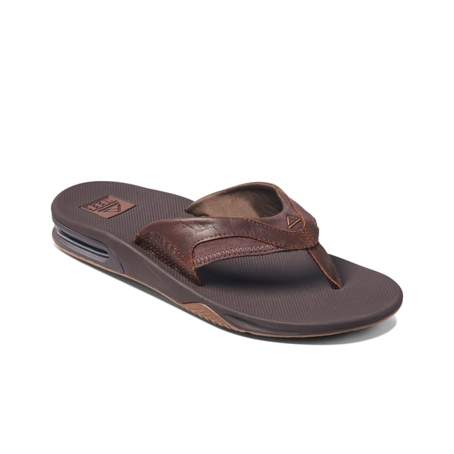 100% Fanning. 100% slide. 100% Reef. The Fanning slide is 300% awesome. With everything that makes the Fanning our bestselling men's shoe, including the crucial built-in bottle opener. Now styled as an easy on, easy off, easy everything slide. 100% do it.