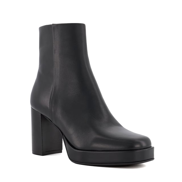 Dune Ladies Pallet - Platform Ankle Boots Evoke 70s styling with our Pallet ankle boots. Crafted from the finest materials, the upper of this square-toed silhouette is detailed with a side zip and enhanced with tonal stitched panels. Set on a flattering platform sole, style Pallet is certain to tick the style boxes throughout the season.