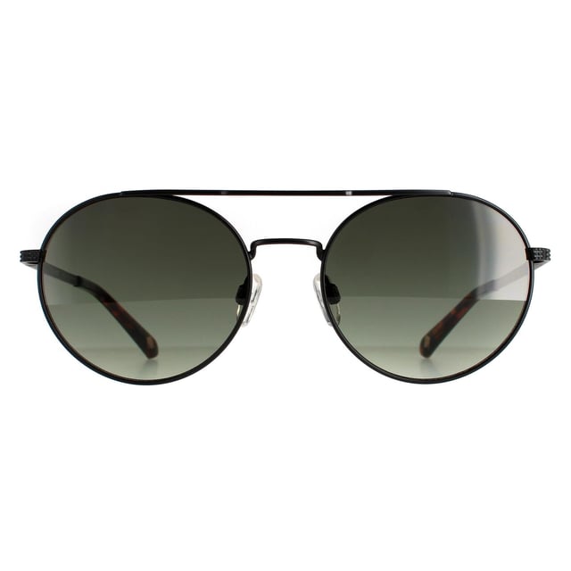 Las gafas de sol Ted Baker Round unisex Black Gray TB1531 Warner son una versión moderna y fresca del clásico estilo redondo con la barra de cejas adicional en la parte superior. Las patillas estructuradas y las plaquetas nasales ajustables completan el look contemporáneo.