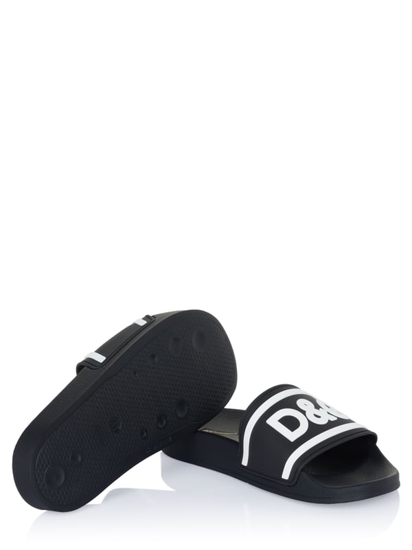Sandalia Dolce & Gabbana Chanclas Dolce & Gabbana; Modelo: CS1732 B9L73 8B939; Mano de obra de alta calidad; Plantilla preformada; punta redonda; Detalles del logotipo de Dolce & Gabbana