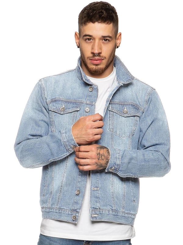 Your favourite wardrobe staple is right on trend this season; this casual Enzo jacket is tailored in washed blue denim for a rebellious look. With designer fashion details like the two chest pockets with buttoned flaps, a shirt style collar and a row of branded metal buttons, this casual layering piece can be worn all year round: wear with a T-shirt for a classic summer look or add a knit for cold weather fashion.