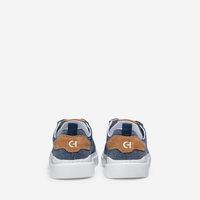 We've given our much-loved, signature GrandPro Rally Court Sneaker an update in organic canvas. Crafted from high-end-yet-durable materials, it features a luxuriously cushioned GRANDFOAM footbed, an EVA outsole, and a classic old-school sneaker vibe