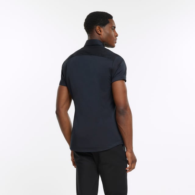 RI branding, Muscle fit, Collar neck, Short sleeve, Button fastening, Our model wears a UK M and is 185.5cm/6'1'' tall, 2 for £35 / "45 / $70 / 499 SEK, Cool Iron, Do Not Bleach, Do Not Dry Clean, Do Not Tumble Dry, Machine Wash 40oC Gentle