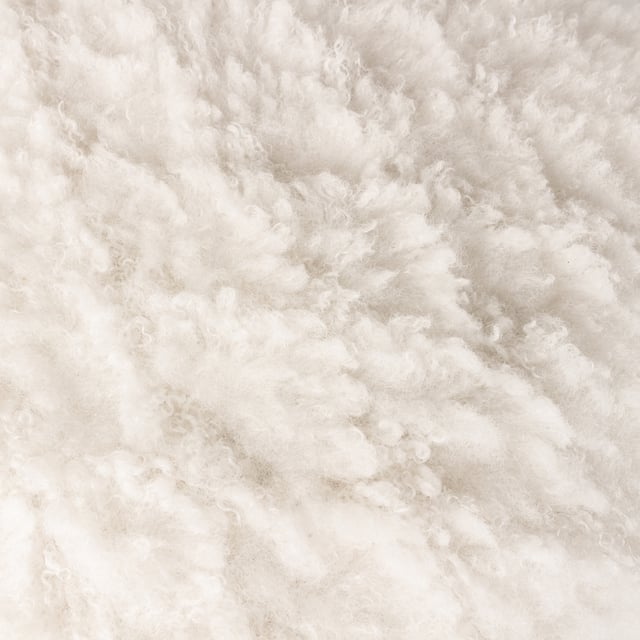Give your room a bold boost. From dreamy cream for a neutral look to shocking shades that bring the drama, look no further. The Fluff Ball cushion is made from ridiculously soft faux fur statement fabric and is finished with a complementing velvet reverse. Perfect for those who love an injection of colour. Size: 45 x 45cm