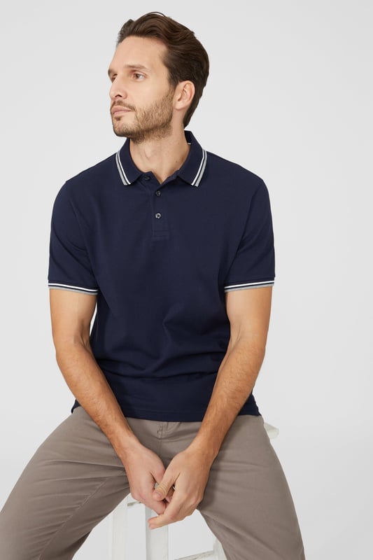 Introducing our Pique Tipped Polo, the perfect addition to any man's smart casual wardrobe. Crafted with meticulous attention to detail, this polo offers a sophisticated and polished look. The pique fabric provides a comfortable and breathable feel, making it ideal for all-day wear. With its stylish tipped collar and cuffs, this polo adds a touch of elegance to any outfit. Whether you're heading to the office or out for a casual gathering, our Pique Tipped Polo is the ultimate choice for a smart and effortlessly stylish look.
