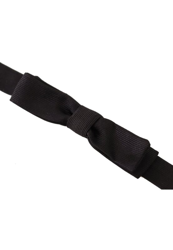 100% Authentic Dolce & Gabbana bow tie
  Exclusive item from the Dolce & Gabbana collection
  Color: Black
  Model: Tied
  Material: 100% Silk
  Adjustable length neck strap
  One size fits all
  Made In Italy