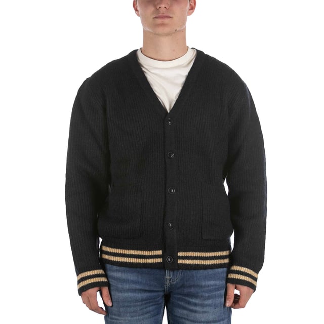 Especificaciones: Cárdigan confeccionado en tejido mezcla de lana, cierre clásico con botones y bolsillos delanteros. Doble raya a contraste en bajo y puños.Corte: Regular La modelo lleva la talla: M Altura del modelo: 180 cm