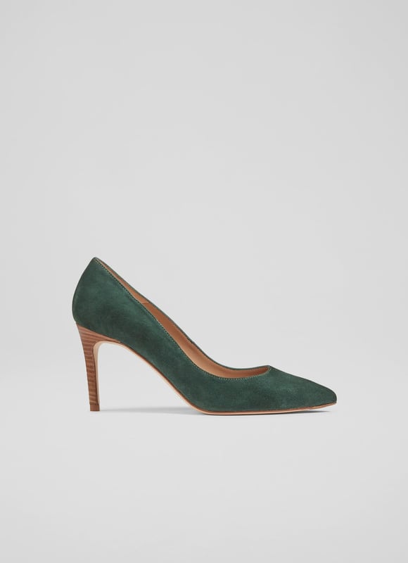 LK Bennett Floret Closed Courts,Dark Green An undeniable 'classic', our Floret courts are a much-loved LKB signature style, with a loyal fan base who appreciate their sleek and stylish everyday appeal. Beautifully-crafted in Spain from super-soft forest green suede, they have a pointed toe, a single sole and a wooden stacked 85mm stiletto heel. They're the perfect courts for dressy moments or for smartening up your workwear.