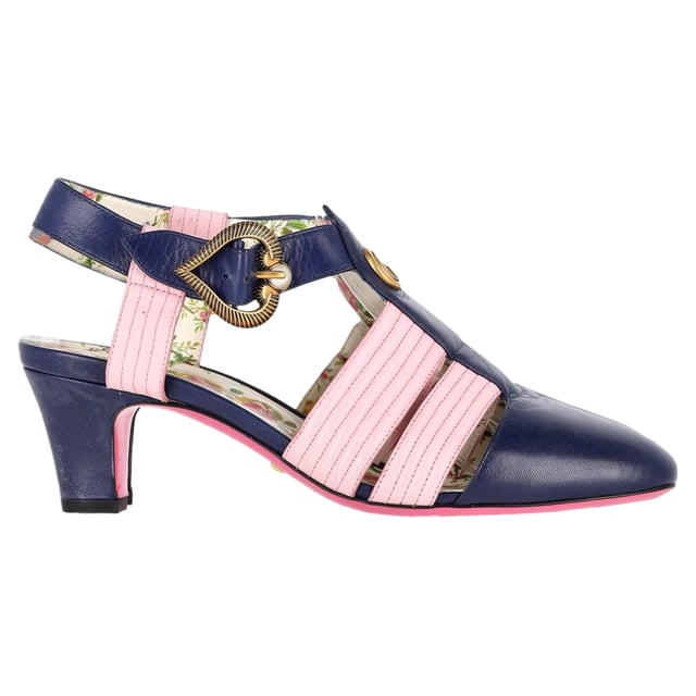 VINTAGE, RRP AS NEW
Step into luxury with the Gucci GG Logo T-Strap Mid-Heeled Sandals in vibrant blue and pink leather. These eye-catching sandals feature the iconic GG logo, beautifully blending high fashion with playful color. The T-strap design provides a flattering silhouette, while the mid-heel offers comfort and stability for all-day wear. Perfect for dressing up a casual outfit or adding flair to an evening ensemble, these sandals are a versatile addition to your footwear collection. Elevate your style and make a bold statement with these stunning Gucci sandals.

Gucci GG Logo T-Strap Mid-Heeled Sandals in Blue and Pink Leather

Condition: Very good
Signs of wear: Minor signs of wear
Packaging: Dust bag
Color: Multicolor
Material: Leather | leather
Size: EU36.5/UK3.5/FR37.5/IT36.5/US6.5
Measurements: Heel height: 80; Insole length: 260
SKU: NAPPUGBSH400793W