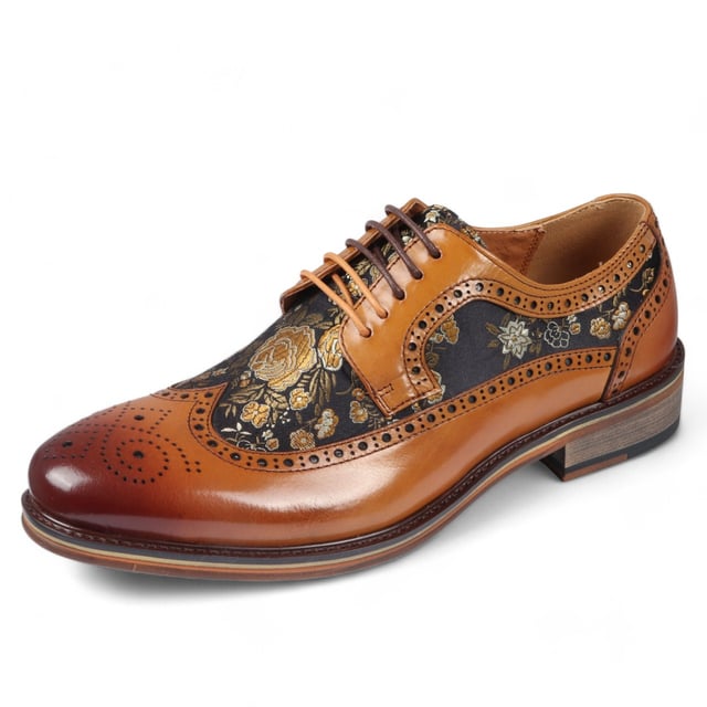 Añade un toque único a tu vestuario formal con los zapatos brogue de cuero con estampado floral para hombre de Ross. Fabricados 100 % con cuero de primera calidad, estos zapatos brogue combinan estilo, durabilidad y comodidad. Con detalles brogue clásicos con patrones decorativos, aportan elegancia y sofisticación a cualquier look. Estampado floral único para una declaración audaz y elegante Cuero de primera calidad para mayor durabilidad y lujo Detalles brogue clásicos para un atractivo atemporal Diseño con cordones para un ajuste ajustable