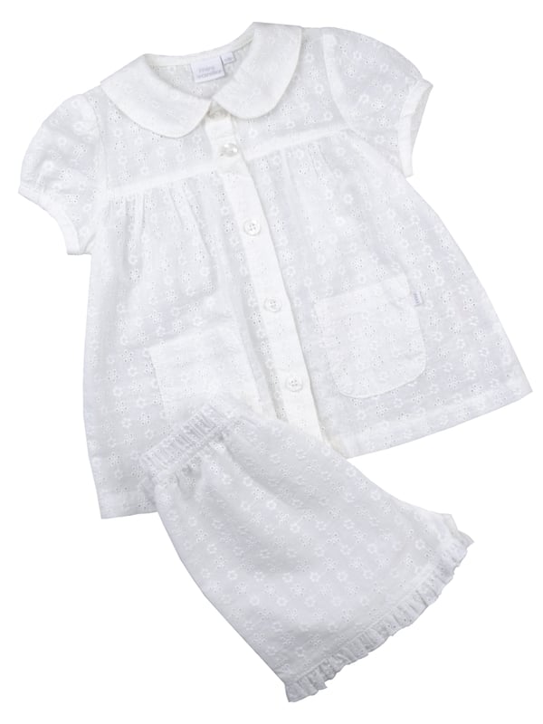 Our beautiful woven embroidery anglaise shortie pyjamas for girls are a lovely choice for Spring. This textured pure-cotton set has a button through top, which is beautifully detailed with a Peter-Pan collar, puff sleeves, engraved buttons and pockets, and woven shorts finished with a lovely frill hem. It makes a wonderful gift for little ones.

Design & Fit

Classic white short sleeve top and shorts
Short-sleeve button through top
Peter Pan Collar
Elasticated waistband
Easy, pull-on style
Fabric and Care

100% Cotton 
Machine wash
Safety warning: keep away from fire