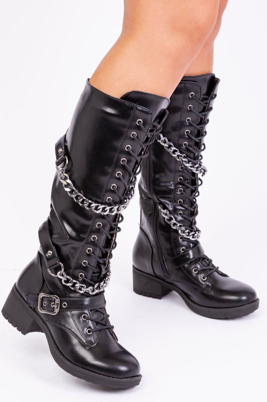 Women's lace up boot with front buckle and silver chain detail