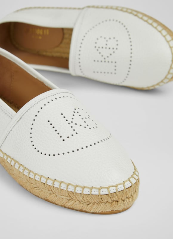 A playful take on the classic flat espadrille, Alexa is a fun everyday summer shoe. Crafted in Spain from super-soft white grainy leather, these round toe espadrilles, have pull-on back tabs, LKB perforation detail to the top of the foot and a woven espadrille sole. Wear them with cotton dresses when the sun shines.