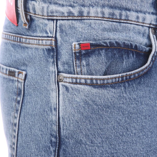 Mens Hugo Boss Loose- Fit Jeans in light blue.- Classic 5 pocket styling.- Zip fly and button fastening.- Leather logo patch.- Tapered leg.- Loose fit.- 99% Cotton  1% Elastane.- Ref: 5050754450