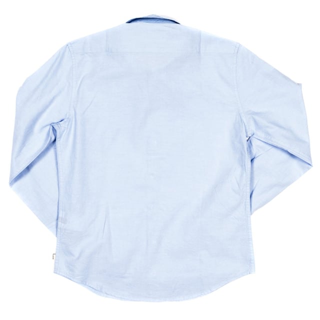 Boy's long sleeve shirt.
 Lapel collar.
 Button closure on the front.
 Custom embroidery by the brand, on the upper front side.
 Cuffs with button closure.
 Fabric label with the flag of the United Kingdom and the name of the brand, on the lower side.
 Seams seen in tone.
 Composition: 100% cotton
 Care:
- Wash maximum at 30ºC.
 - Iron at medium temperature, max. 110ºC.
 - It is not allowed to use a dryer.
 - Do not use bleach.
 - Does not support dry cleaning.