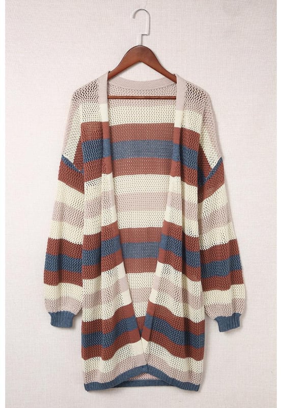 Striped color block design
  Hollowed knit pattern
  Made for women
  Relaxed fit
  Versatile and stylish
  Comfortable fabric
  Perfect for layering
  Elevates any outfit
Material: 55% Acrylic 45% Cotton