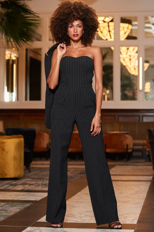 The jumpsuit of dreamsSculpting corset-style bodiceSexy sweetheart bandeau necklineWide-legs for an ultra flattering fitPinstripes are always in styleJust add barely-there heelsInside leg to fit: Short 29" | Regular 31" | Long 33"
