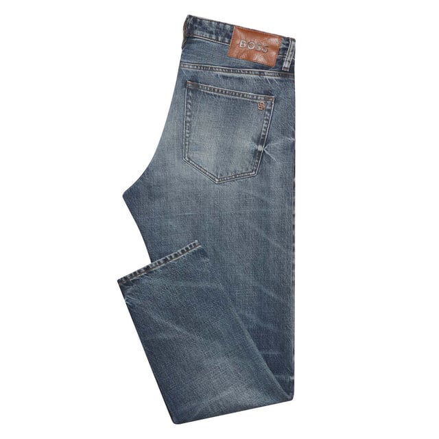 Mens BOSS Troy Selvedge Regular-Fit Jeans in blue.- Button closure.- Five pocket design.- Belt loops.- BOSS metal logo stud.- BOSS leather logo patch.- Top stitched.- Regular fit.- Ref: 50527222436
