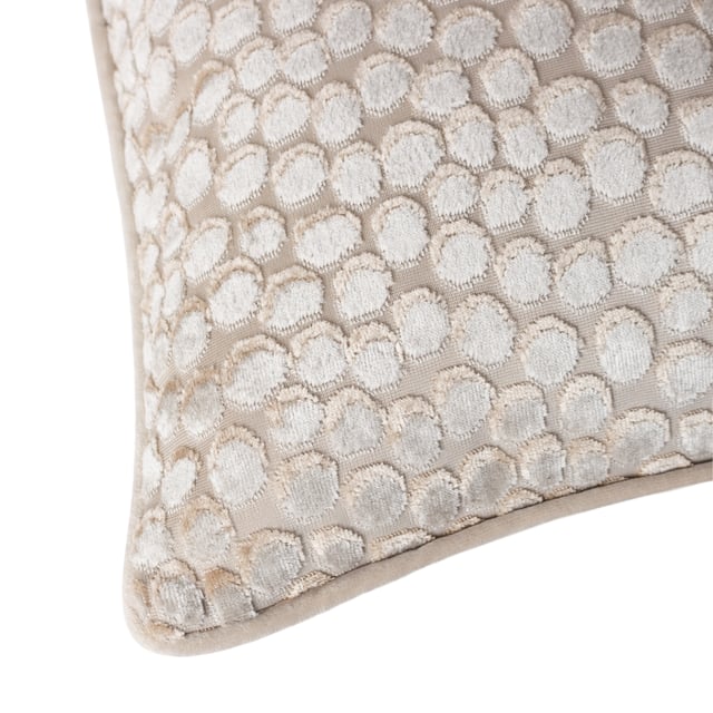 The Lanzo cushion is cleverly designed with small, abstract circles of dark and light cut velvet, to create a stunning 3D-like effect. It provides a subtle injection of verve and colour, sitting effortlessly and elegantly on your home furnishings. Finished with a soft velvet reverse, complimenting piped trim and a hidden zip fastening, Lanzo will make its mark in any surroundings.