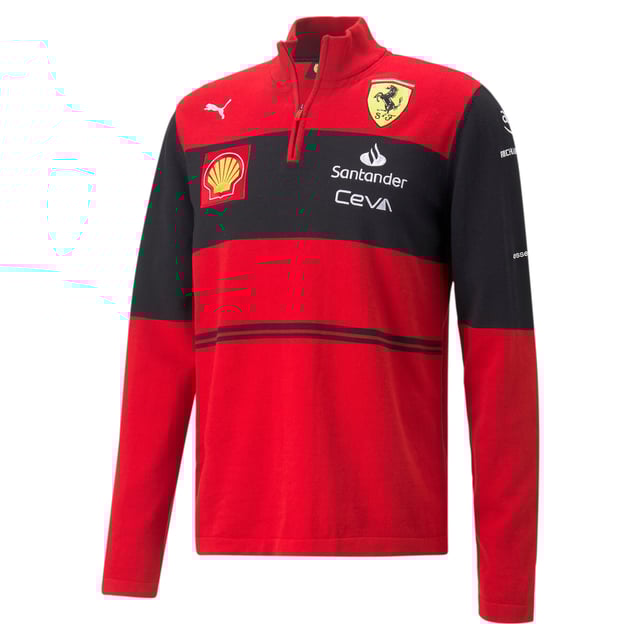 HISTORIA DEL PRODUCTO Luce con orgullo tu pasión por la Scuderia Ferrari con esta sudadera de punto con media cremallera, inspirada en los colores del equipo. Su atrevido diseño de bloques de color evoca los trajes de carreras históricos de la Scuderia Ferrari, mientras que el gráfico se inspira en el edificio Gestione Sportiva de la Scuderia Ferrari en Maranello para añadir un toque moderno. Usada en la parrilla por el equipo Scuderia Ferrari durante la temporada 2022 de Fórmula 1™, esta sudadera ha sido diseñada para verdaderos fans como tú.DETALLES .Sistemas de cierre de media cremallera con cuello alto.Mangas largas.Marcas Scuderia Ferrari y PUMA.