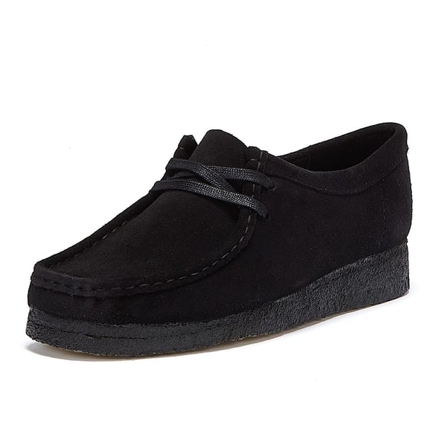 Launched in 1964, the moccasin-inspired Wallabee, with its clean and simple lines, has become an iconic Clarks design. Crafted from premium suede this classic design features a distinctive crepe sole along with a 2-eye lace-up fastening .