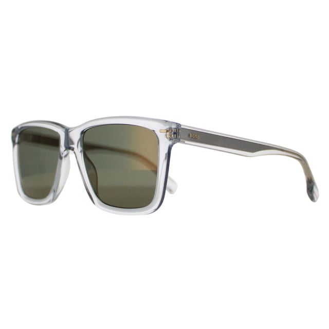 Las gafas de sol Hugo Boss Square para hombre en gris transparente, verde y dorado con espejo BOSS 1317/S son un modelo cuadrado clásico elaborado en acetato ligero. Las patillas finas llevan el logotipo de Hugo Boss para mayor autenticidad.