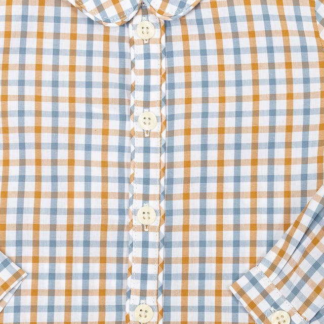 Long-sleeve shirt.
 Lapel collar.
 Button closure at the front.
 Cuff with button closure.
 Seams seen in tone.
 Composition: 100% cotton
 Care:
- Wash at max. 30ºC.
 - Do not use bleach.
 - Iron at low temperature.
 - Supports dry cleaning.
 - Do not use dryer.