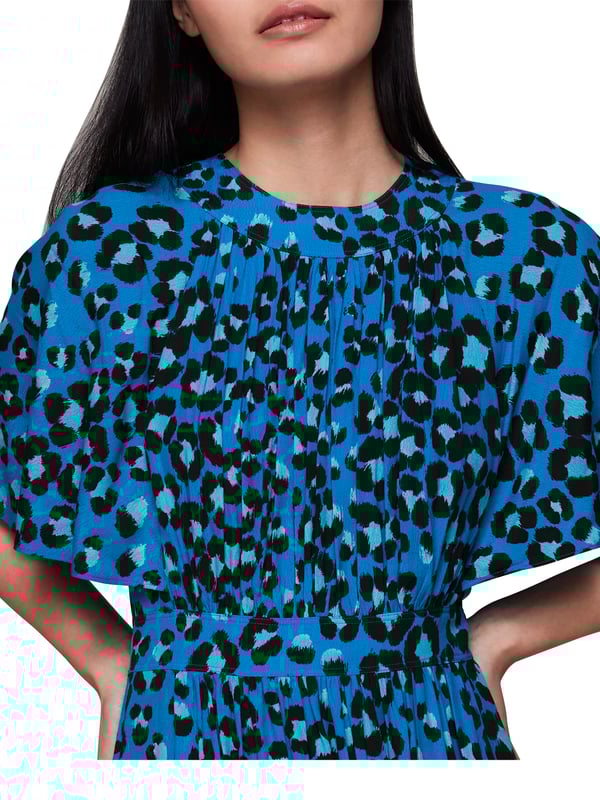 Step out in sustainable style with our 'Painted Leopard Midi Dress', perfect for adding a splash of colour and pattern to your day. Whether enjoying leisure time or dressing up for a casual outing, this eco-conscious piece with its tie neck and comfortable fit brings an effortless flair to any wardrobe.