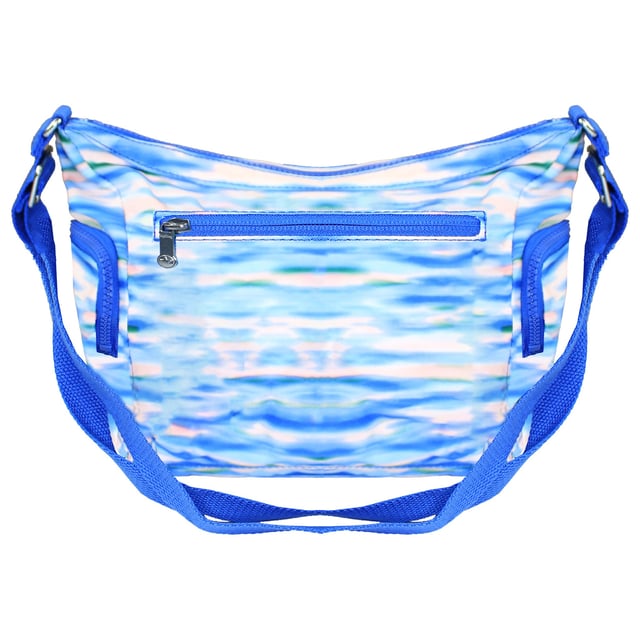 The Kipling Gabb S Printed Women's Blue Crossbody Bag combines practicality with a touch of playful style. This compact yet spacious crossbody bag is perfect for everyday use, offering a chic way to keep your essentials organized and easily accessible. The unique printed design in shades of blue adds a fashionable flair, making it an eye-catching accessory for any outfit.
 
Key Features:
Durable Nylon Material: 

Crafted from Kipling’s signature crinkle nylon, this bag is lightweight, water-resistant, and easy to clean, ensuring long-lasting durability and performance.

Compact Size with Ample Storage: 

Despite its small stature, the Gabb S provides a surprisingly spacious main compartment with a secure zip closure, allowing you to carry essentials like your phone, wallet, and makeup.

Multiple Pockets for Organization: 

Features an interior zip pocket for securing valuables, along with two front zip pockets and a back pocket for quick access to frequently used items, keeping everything organized and easy to find.

Adjustable Crossbody Strap: 

The adjustable strap lets you customize the fit, providing comfortable hands-free convenience for all-day wear.

Lightweight and Travel-Friendly: 

Designed to be exceptionally light, this bag is perfect for travel, shopping, or daily outings where you want to keep your hands free.

Stylish Printed Design: 

The charming blue print adds a trendy touch, making this crossbody bag suitable for a variety of casual settings and outfits.

Signature Monkey Keychain: 

Includes Kipling’s iconic monkey charm, adding a fun and distinctive detail that reflects the brand's playful spirit.

 
The Kipling Gabb S Printed Women's Blue Crossbody Bag is the ideal blend of style and functionality. Its compact design and organized storage make it a must-have for women who appreciate convenience without compromising on fashion. Whether you're heading out for errands or enjoying a day out, this bag will keep your essentials close at hand while adding a vibrant touch to your ensemble.