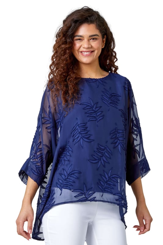 Leaf Burnout Print Chiffon Overlay Top from Roman. Dare to reveal all? Well this stunning mesh leaf embossed top is perfect for those evenings out. Featuring a round neckline with 3/4 length batwing sleeves, finished with a longer back hem and a silky cami top lining underneath for that added extra glam. Opt for faux leather leggings and heels for date night or alternatively some cropped trousers and wedges for your holiday night out.