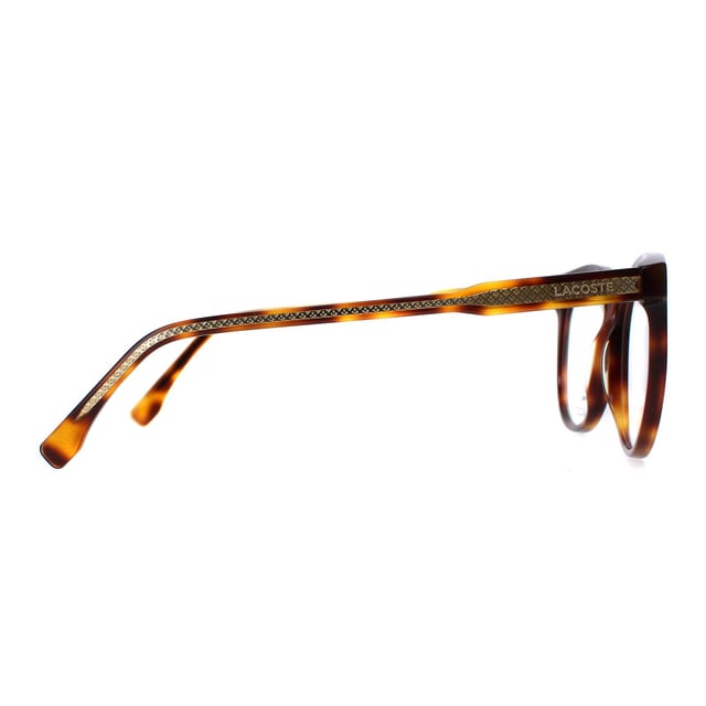 Lacoste Round Womens Brown Havana L2869  Glasses are a stylish and contemporary eyewear option that combines modern round design with high-quality materials to create a sleek and sophisticated look. The frames are made of lightweight plastic and the Lacoste branding on the temples adds a touch of sophistication.
