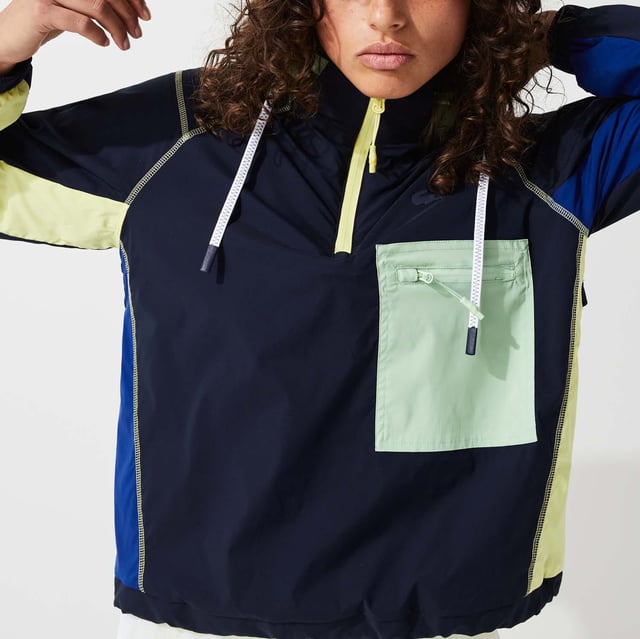 Women’s Colour-block Accents Pullover Windbreaker - Hood with adjustable drawstring and stoppers- Contrast zip fastening - Polyester and mesh lining - Contrast zip pocket in front - Elasticised wristbands and leg bottoms- Contrast details on sleeves and body- Flap in back with adjustable elasticised drawstring - Silicone crocodile- Ref: BF5682-AY3