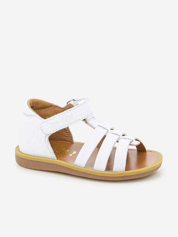 Introducing the Girls Leather Poppy Strap Sandals by Pom D Api in stunning white, perfect for your little girl's Holiday wardrobe. Check out its wonderful features: Chic Design: With an elegant poppy strap, these sandals infuse charm and style, making them a real show-stopper.Premium Quality: Crafted from exquisite genuine leather for unmatched comfort, these sandals are perfect for her delicate feet. Holiday Perfect: The crisp white colour makes these sandals versatile, pairing beautifully with any holiday ensemble.Redefine her wardrobe with these Girls Leather Poppy Strap Sandals in White from Pom D Api. Order now to gift her unparalleled comfort and style!